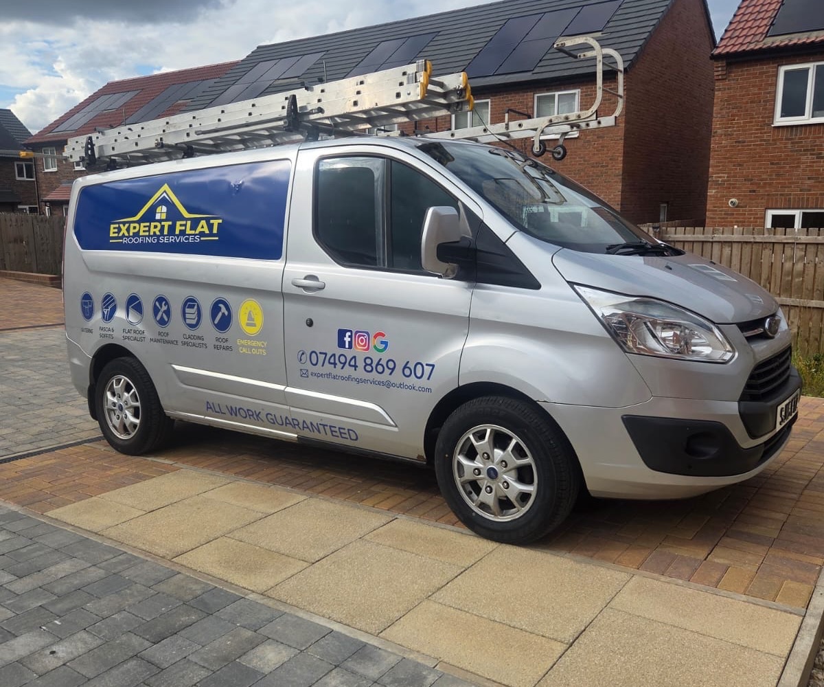 Expert Flat Roofing Services branded van parked on a driveway in Newcastle, ladders on the roof rack